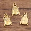 Gold stainless steel beetle charms with sparkling crystals, perfect for DIY jewelry making. - Style 3 Beetle