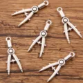 Pendentifs boussole en alliage argenté pour la fabrication de bijoux DIY, papeterie. - Style Compas