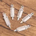Silver syringe metal pendants for DIY crafts, retro medical charm jewelry making supplies. - Style 12 Medical Charm / 1 Piece/Pack (8x30mm)
