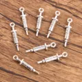 Silver syringe charms pendant DIY metal craft jewelry making supplies medical theme. - Style 19 Medical Charm / 1 Piece (6x24mm)