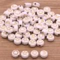 Perles intermédiaires en résine acrylique étoiles cœurs fleurs DIY bijoux enfants 100pcs - Plat Blanc avec Icônes Dorées (6) / Pack de 100