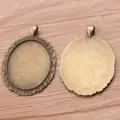 Bronze alloy oval bezel pendant tray detail view, DIY jewelry making accessory base. - Antique Bronze
