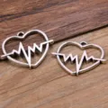 Vintage zilveren legering hart EKG hartslag hanger DIY sieraden accessoires ambachten - Opengewerkte Hartslag Hart ECG Hanger / 24x30mm / Antiek Zilver