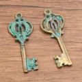 Vintage bronze brushed green key charms, alloy crown hollow pendant for DIY jewelry making. - 2 Key 16X43mm 2.4g / 1 Piece
