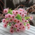 Close-up detail of artificial pink veined flower bouquet for home floral decor display. - Pink