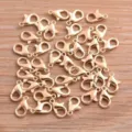 Gold lobster clasps detail closeup, 8x12mm DIY metal jewelry findings for bracelets and necklaces - KC Gold
