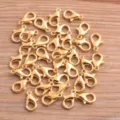 Gold lobster clasps for DIY jewelry making, ideal for necklaces and bracelets. - Gold