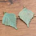 Vintage bronze green leaf metal alloy pendants charms for DIY jewelry making and craft projects. - 1 Piece (45X70mm)