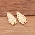 Detailed close-up view of golden arrow shape alloy DIY pendant charms with hammered texture. - KC Gold