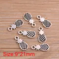 Detailed view of 9x21mm pineapple alloy charms, perfect for DIY jewelry making and craft projects. - Antique Silver