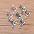 Detail of antique silver alloy Christmas candy cane bow scepter pendant DIY jewelry charm - Antique Silver