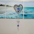 Carillón de viento de acero inoxidable en forma de corazón con cuentas de cristal. - Corazón (Giratorio de Hilo de Pesca)
