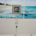 Stainless steel square wind spinner detail hanging in room with crystal and green glass balls - Square (Fishing Line Rotating)