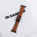 Brown leather replacement watch band compatible with Apple Watch with distinctive X metal buckle. - Brown