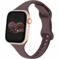 Detailed view of a compatible smartwatch with a brown silicone band and gold case. - 38/40/41mm / Smoke Purple