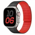 Detail view of the black and red silicone magnetic watch strap compatible with Apple Watch. - 38/40/41mm / Black + Red