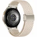 Close-up detail of the woven nylon magnetic watch strap connector and smartwatch back view. - 20mm / Star