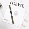 Green leather watch strap featuring folding clasp displayed on luxury marble background details - 14mm / Olive Green