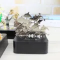 Magnetic dolphin sculpture desktop ornament with metallic figures on base for creative room decor gift. - Dolphin