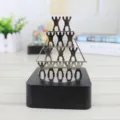 Magnetische Balance Deko Metall Figuren Schwerkraft Pyramide Tischschmuck Geschenk - Strongman