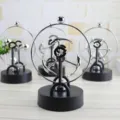 Nahaufnahme im Detail des magnetischen kinetischen Kunst-Schreibtischspielzeugs aus Metall. - Stil C205