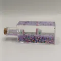 Decorative purple liquid drift bottle with mini mahjong and cute glitter shapes. - Square Bottle Mahjong Purple