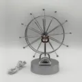 Silver metal Ferris wheel perpetual motion machine balance toy with USB cable for office desk decor. - USB or Battery Powered / Silver