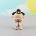 Detaillierte Nahaufnahme der niedlichen chinesischen Figur als Tortendekoration. - 7.5x4cm / Modell 2501D