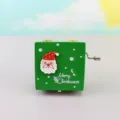 Close-up of wooden Christmas music box with cute Santa Claus face and hand crank mechanism. - Santa Hat (Hand-Cranked)
