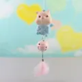 Closeup detail of cute cat figurine hanging ornament with pink bell and soft feather decoration. - 1087-5 Pointed Ears
