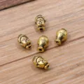 Legering Boeddha hoofd en vaas kralen, gouden DIY afstandskralen voor sieraden maken. - Antiek Goud