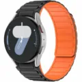 Silicone magnetic watch strap detail view, flexible soft band replacement for smartwatch. - Black + Orange