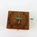 Hand-cranked wooden music box with vintage ballerina design and melody tune for birthday gifts. - Dancing Girl