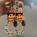 Colgante de teléfono Crybaby de cuentas mate hecho a mano correa de café accesorio lindo - Correa para móvil de cuentas café con leche