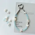 Colgante de teléfono con cuentas de estrella de mar azul océano correa de verano - Cadena de Teléfono Carta del Mar / Aguamarina