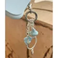 Detailed close-up of a sweet-cool blue mushroom and flower metal snake bone phone charm. - Blue Mushroom Snake Bone Chain Pendant / Blue