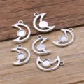 Silver alloy moon bezel pendant charms for DIY jewelry making, geometric hollow design pieces. - Hollow Moon Pendant