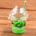 Miniature resin kiwi fruit cup charm, detailed DIY craft accessory close-up display. - Green