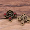 Antique bronze alloy hollow flower multi-hole jewelry connector with red resin gemstones. - Antique Bronze - Red
