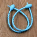 Reusable soft silicone cable tie with oval head design, flexible wire organizer tool for daily use. - Blue