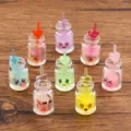Detailed view of 15x34mm DIY resin bottle charms featuring cute expressions and nice heart straws. - Random Mixed Colors