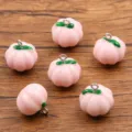 Pink resin pumpkin charms with green leaves and metal loop for DIY jewelry necklaces crafts - Pink