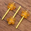 Yellow glowing flower lollipop resin pendant DIY accessory for phone and bag charm - Orange