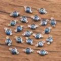Connecteurs de breloques de fleurs mauvais œil en acier inoxydable pour bijoux DIY bracelet 7x12mm. - Bleu