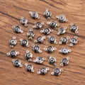 Connecteurs de breloques en oeil de fleur en acier inoxydable pour bijoux 7x12mm - Noir