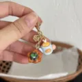 Handmade miniature teapot and pastry charm detail shot, cute resin keychain pendant. - Blueberry Teapot Pendant