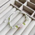Handmade braided crystal bracelet with pink quartz and green stone, elegant daily jewelry accessory. - Rose Quartz Braided Rope Bracelet (1 Piece)