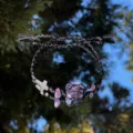 Handmade black macrame crystal bracelet with raw amethyst and cross charm for women. - Maiden's Prayer Cord Bracelet
