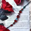 Handmade macrame crystal net pocket bracelet with red beads and blue butterfly pendant. - One Red Rose Cord Bracelet (Without Tassel)