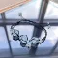 Handmade black cord macrame crystal stone net pocket bracelet with blue flower charm gift. - One Macrame Bracelet